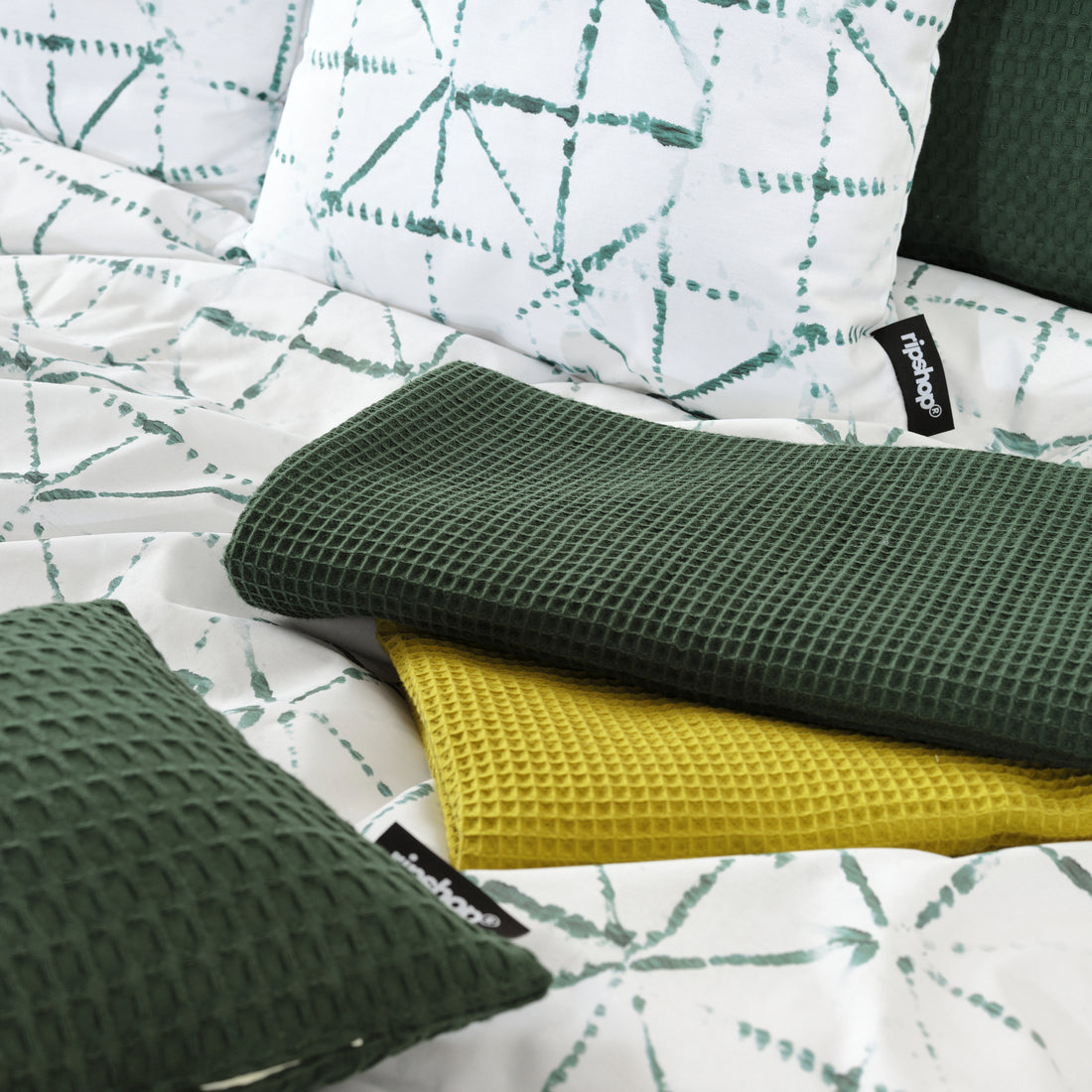Serviette gaufrée 100% coton vert bouteille