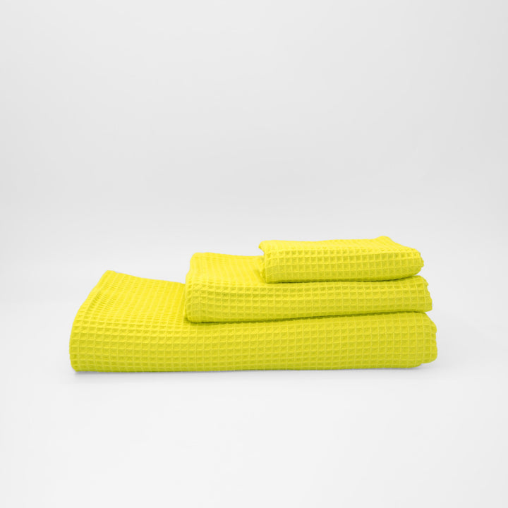 Serviette gaufrée 100% coton jaune