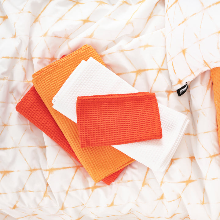 Serviette gaufrée 100 % coton orange clair