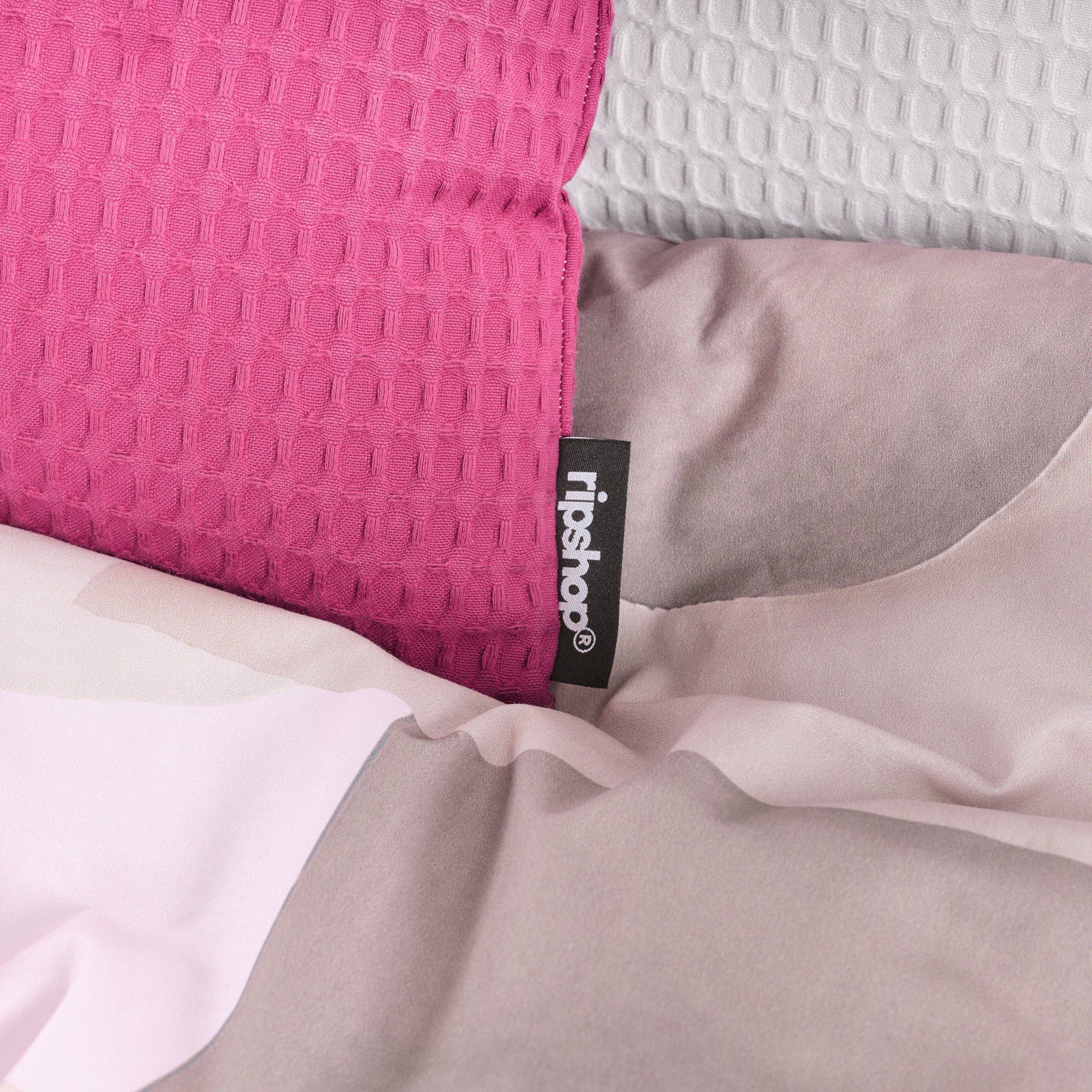 Housse de coussin gaufré 100% coton Fuchsia 30x50 cm