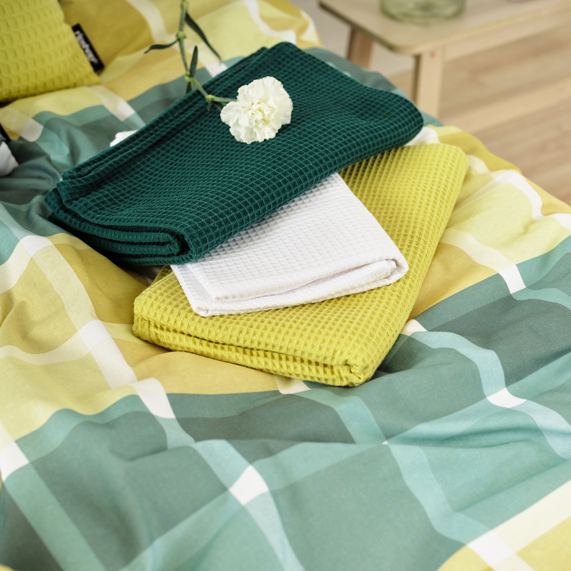 Serviette gaufrée 100% coton émeraude