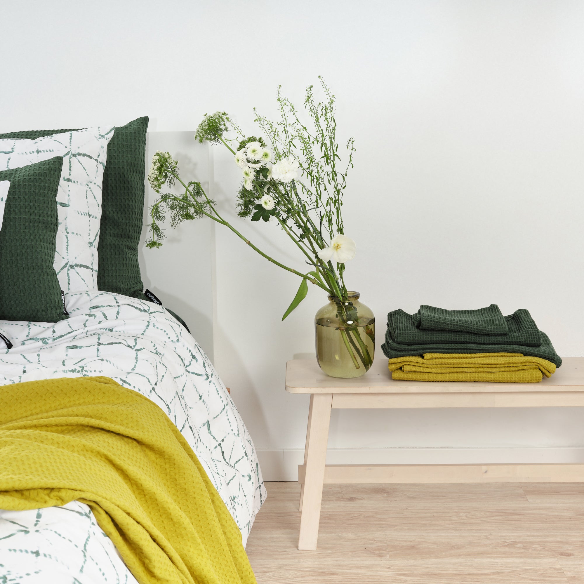 Serviette gaufrée 100% coton vert bouteille