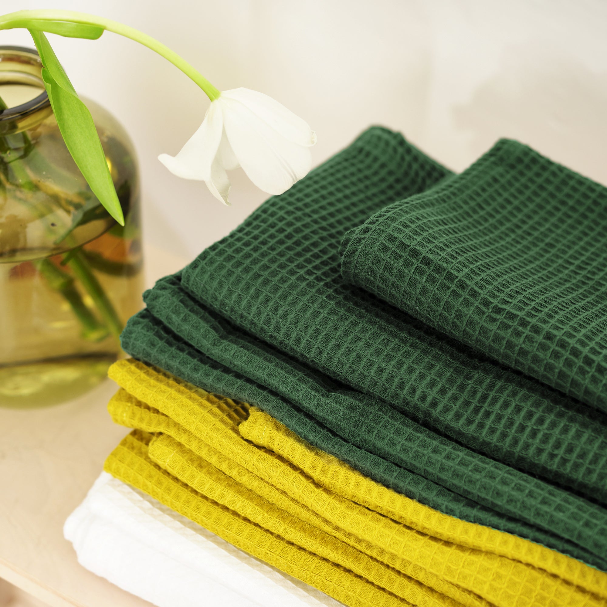 Serviette gaufrée 100% coton vert bouteille