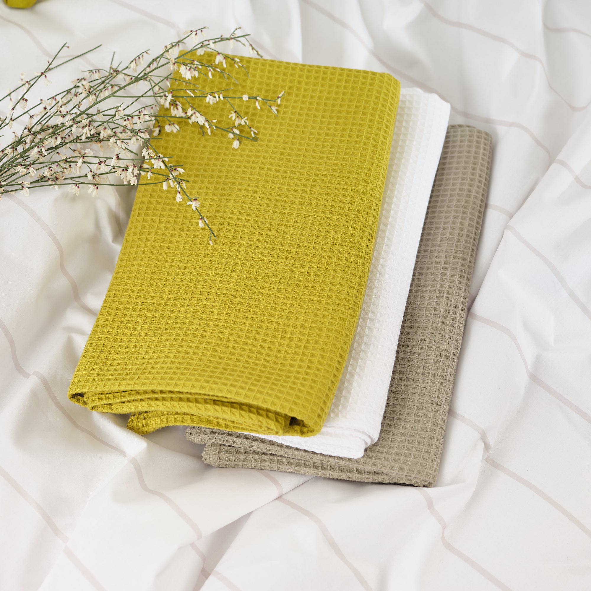 Serviette gaufrée 100% coton vert pistache