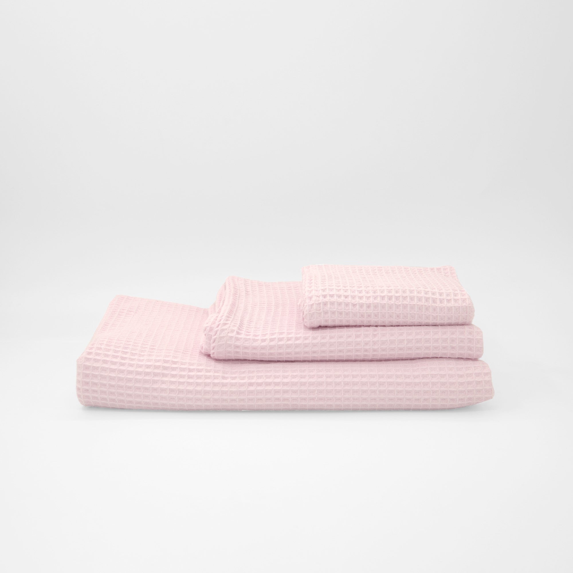 Serviette gaufrée 100% coton rose pâle